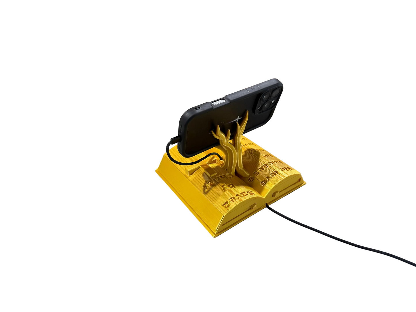 Christian Gift for Men & Women – Bible Verse Phone Stand | 1 John 4:19 | “Saved by Christ” Engraved Cross | Faith Desk Organizer